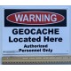 Geocache Located Here Sign